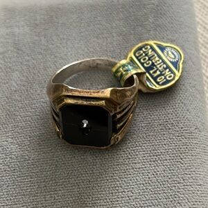 Man’s 10 KT gold on sterling ring with original tag!
